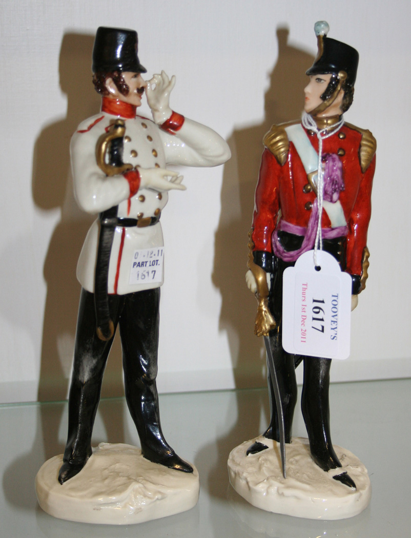 A pair of Continental porcelain figures of soldiers, 20th Century, each