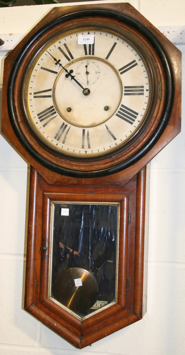 A Late 19th Century American Ansonia Walnut Drop Dial Wall Clock With Eight Day Movement Striking On