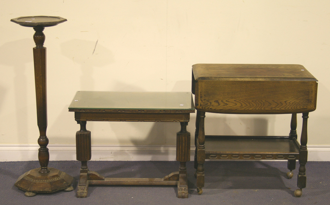 An oak jardinière stand, a tea trolley and a coffee table.