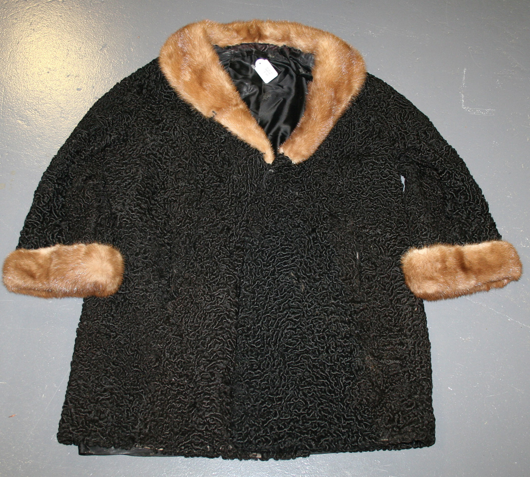 An early/mid-20th Century Persian lamb fur coat with brown fur collar ...