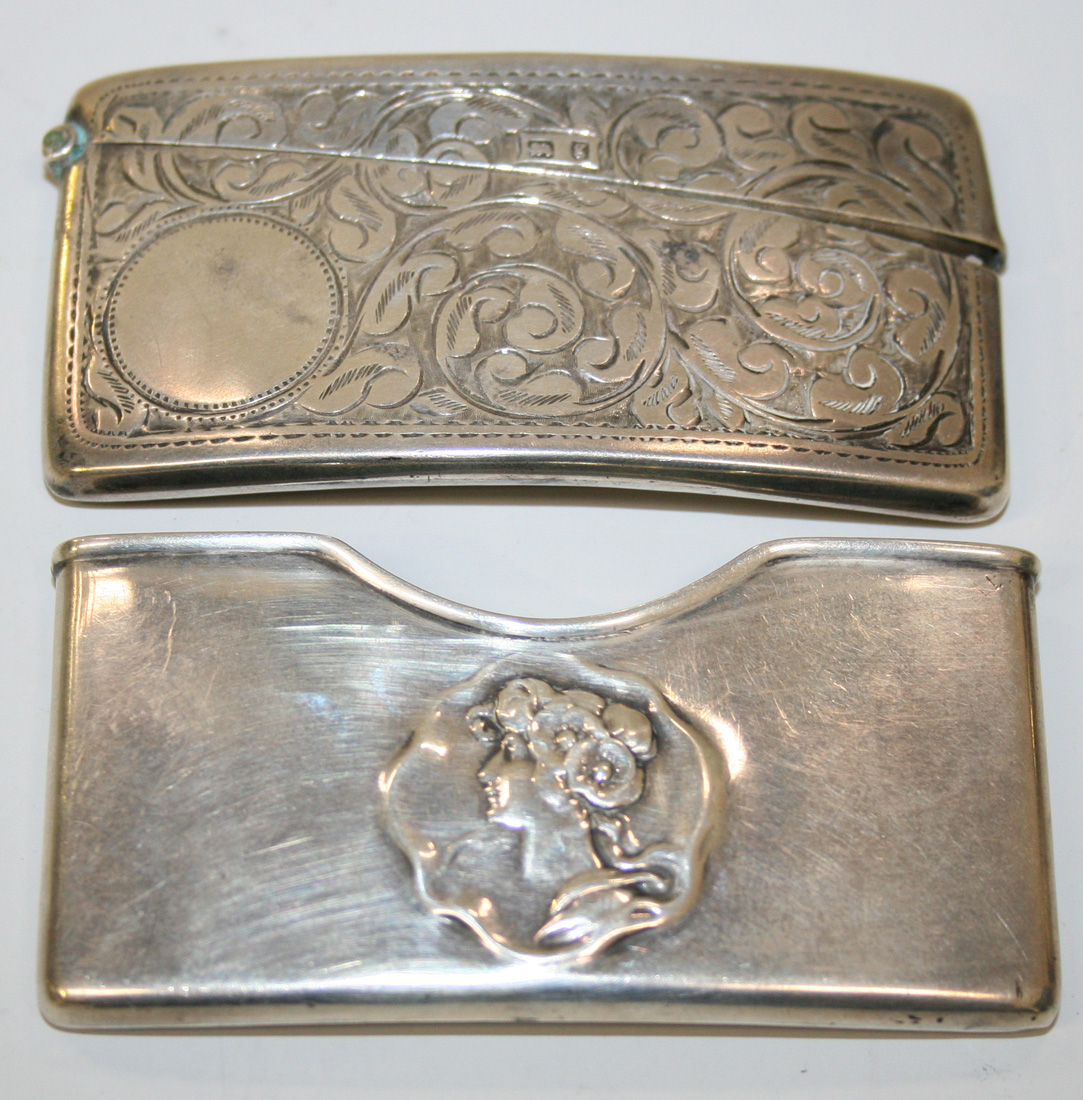 an-art-nouveau-silver-card-sleeve-the-front-decorated-with-a-head-and