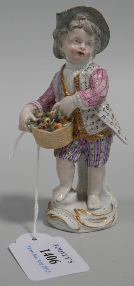 A Meissen porcelain figure, 19th Century, modelled as a boy wearing ...