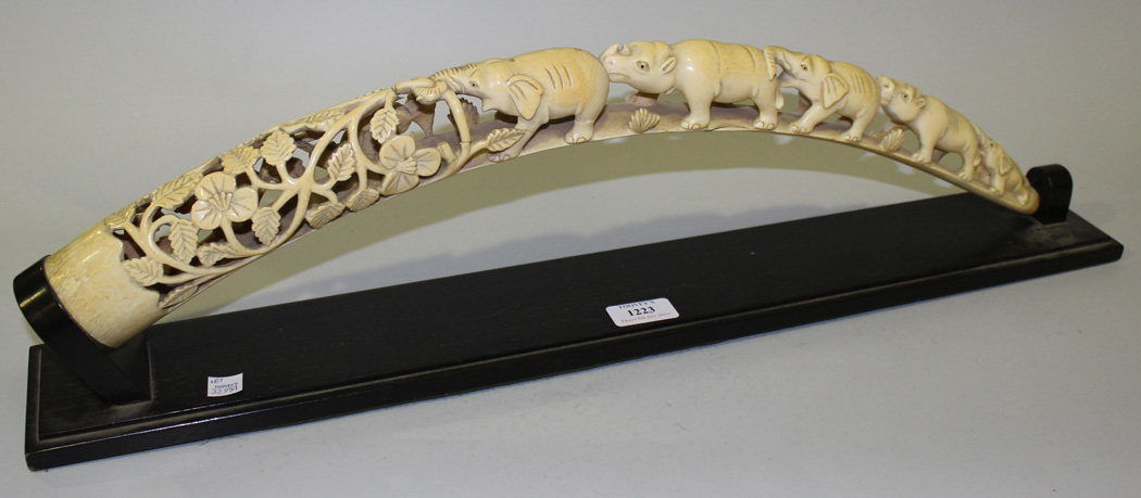 A carved ivory elephant tusk, early 20th Century, carved and pierced