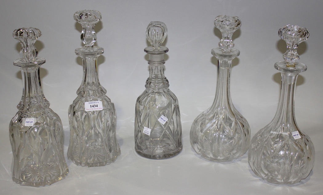 A Pair Of Cut Glass Decanters And Stoppers Of Bell Shaped Form With Cut And Polished Decoration Tog