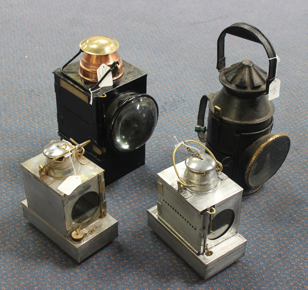 A collection of four railway lamps, comprising a Welch Patent B.R.(S