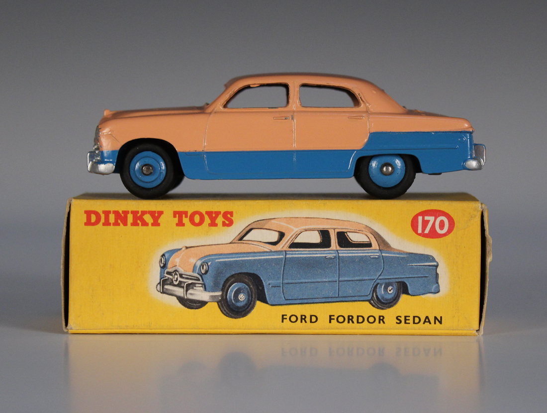A Dinky Toys No. 170 Ford Fodor sedan, finished in blue and pink 