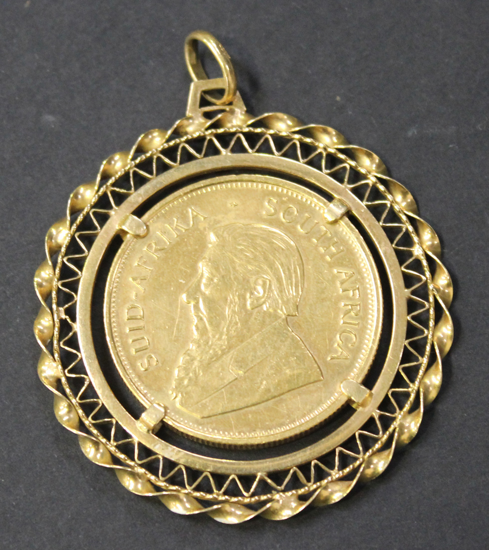 A South Africa Krugerrand 1973, mounted as a pendant.