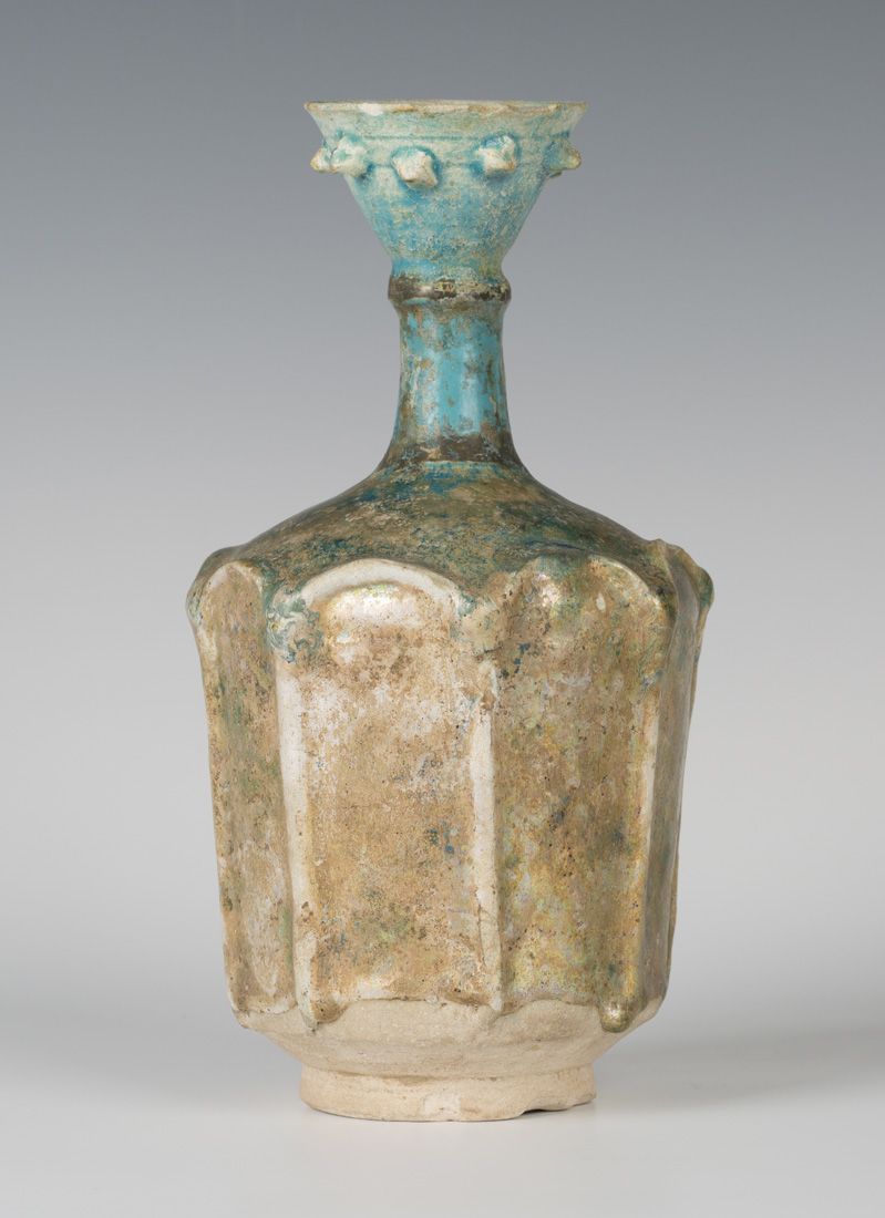 A Kashan Pottery Turquoise Glazed Rosewater Sprinkler 12th 13th Century The Octagonal Moulded Body