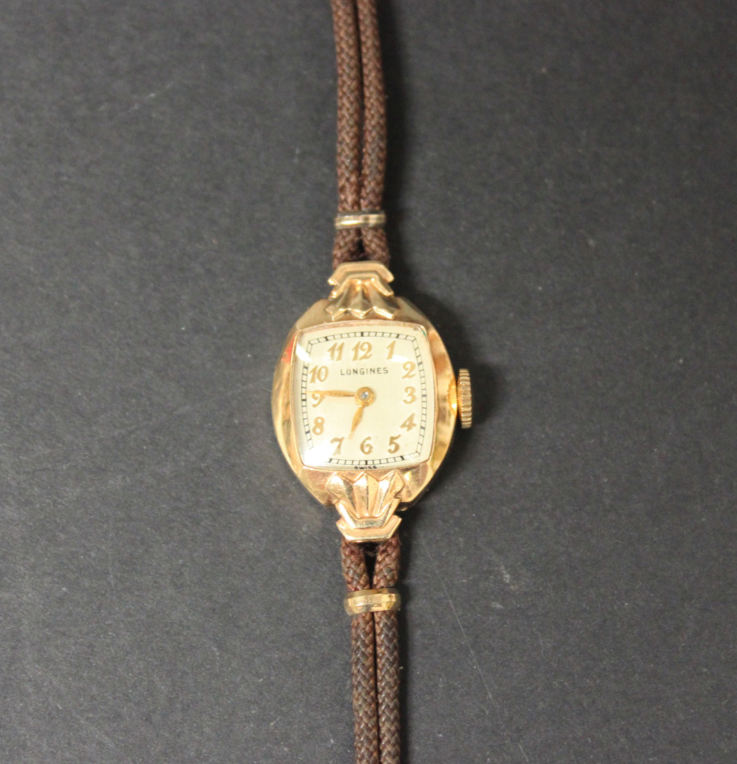 A Longines gold cased lady's wristwatch, the signed jewelled movement ...
