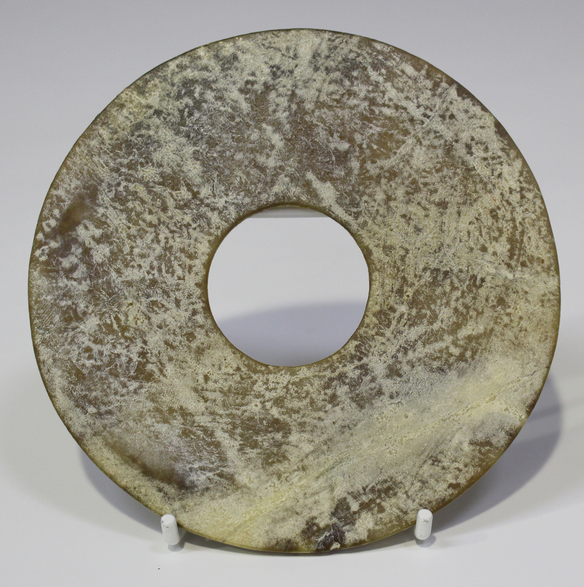 A Chinese archaistic jade Bi (disc), possibly Han dynasty, the stone of ...