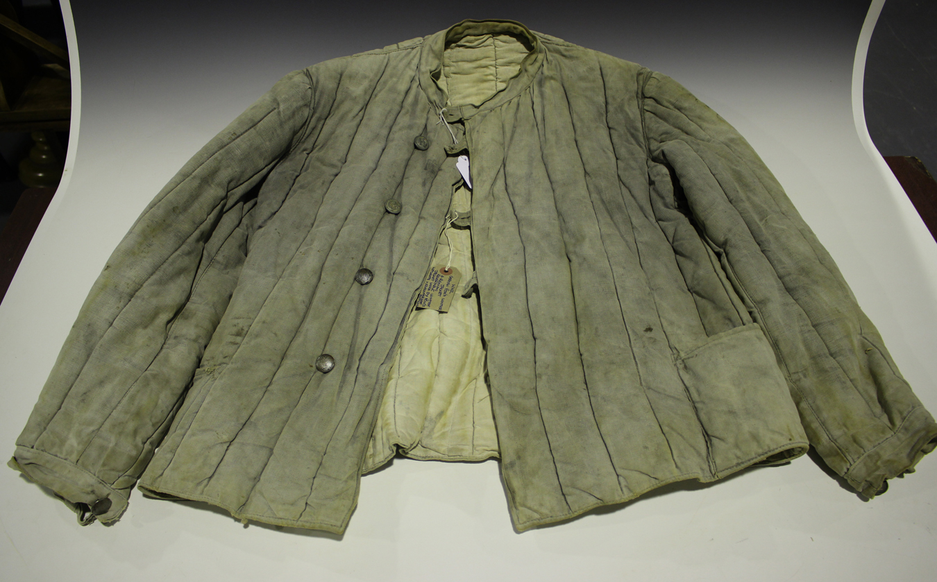 A Russian padded winter jacket of the type worn by German POWs, with ...