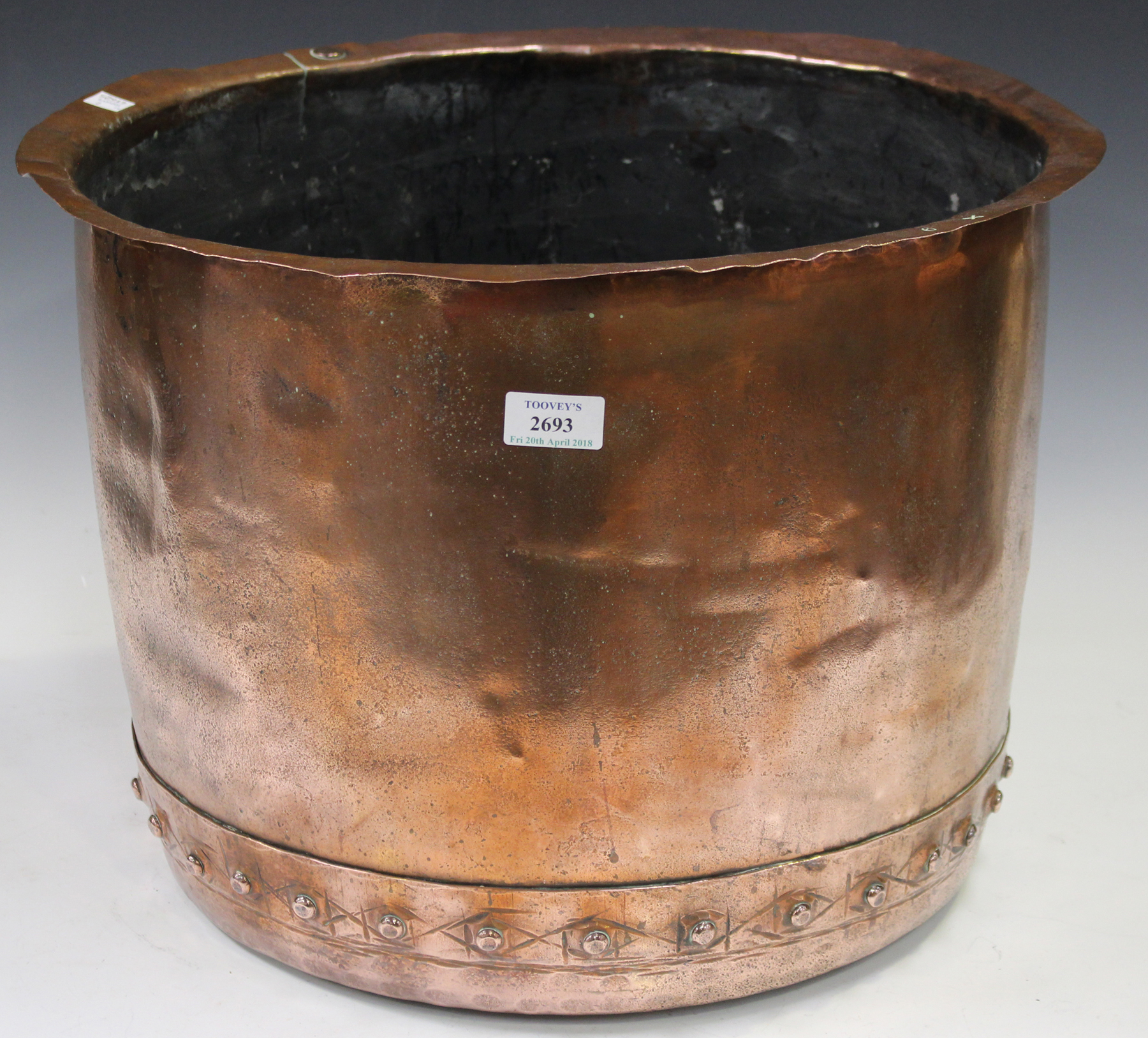 A Victorian copper log basket of studded construction, height 35cm