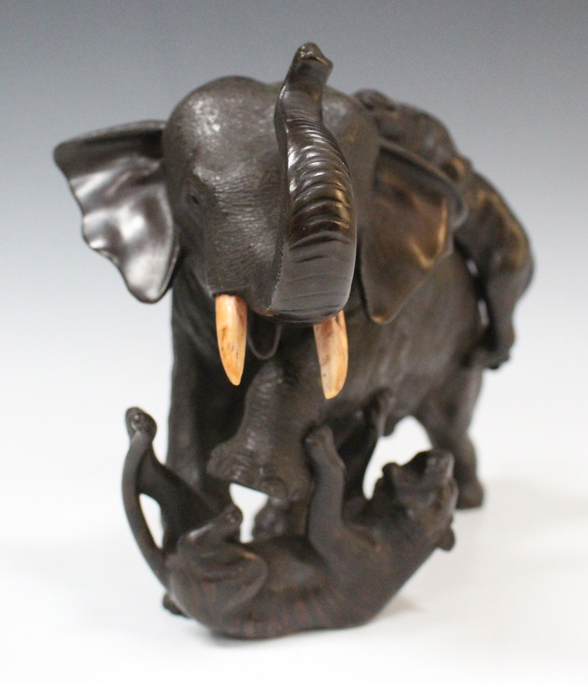 A Japanese brown patinated bronze elephant figure group by