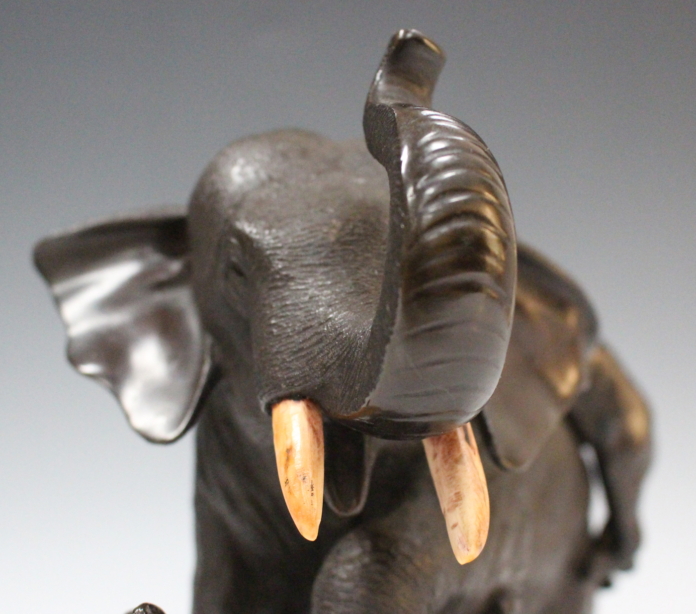 A Japanese brown patinated bronze elephant figure group by