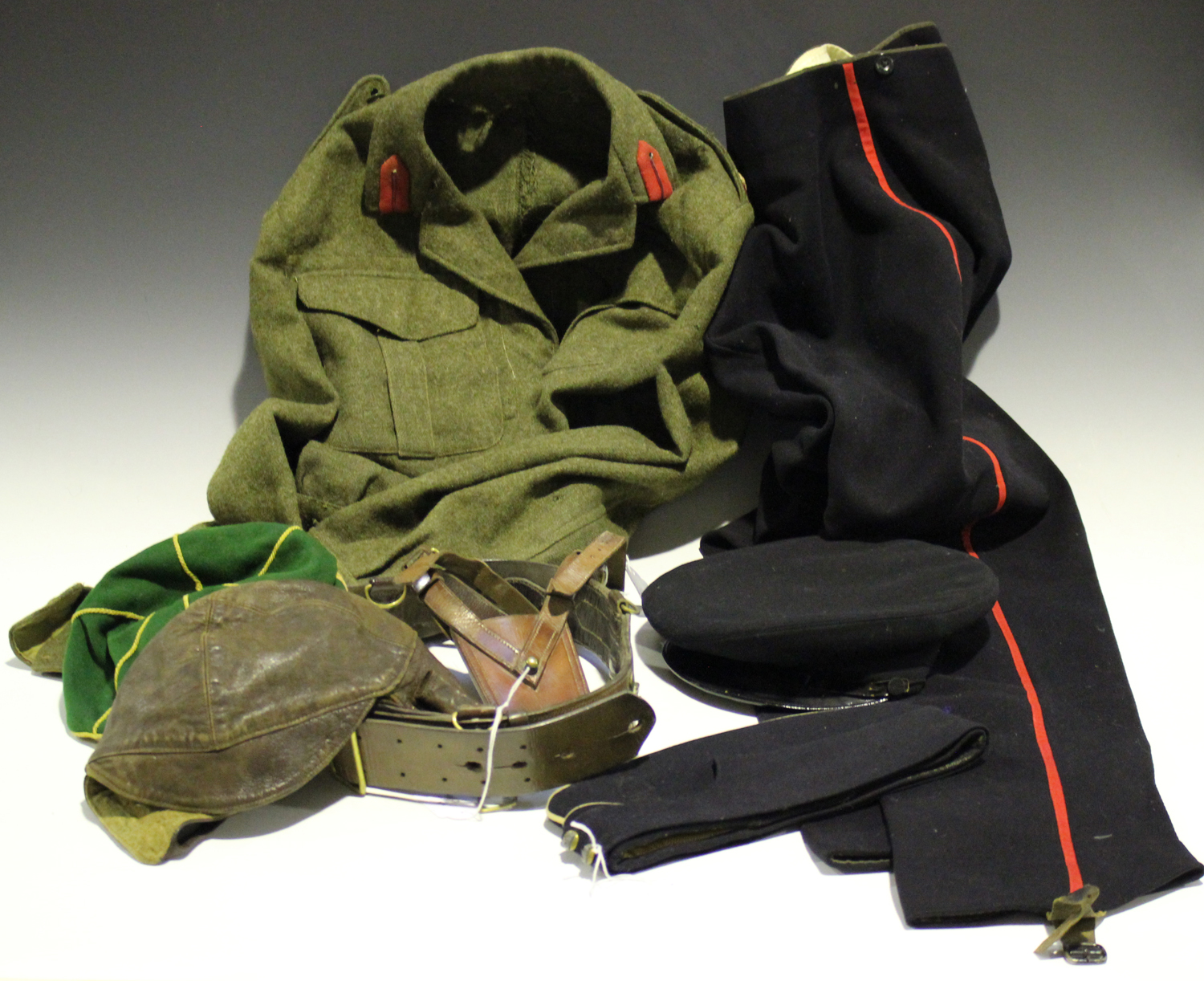 A small collection of various military and other uniforms and ...