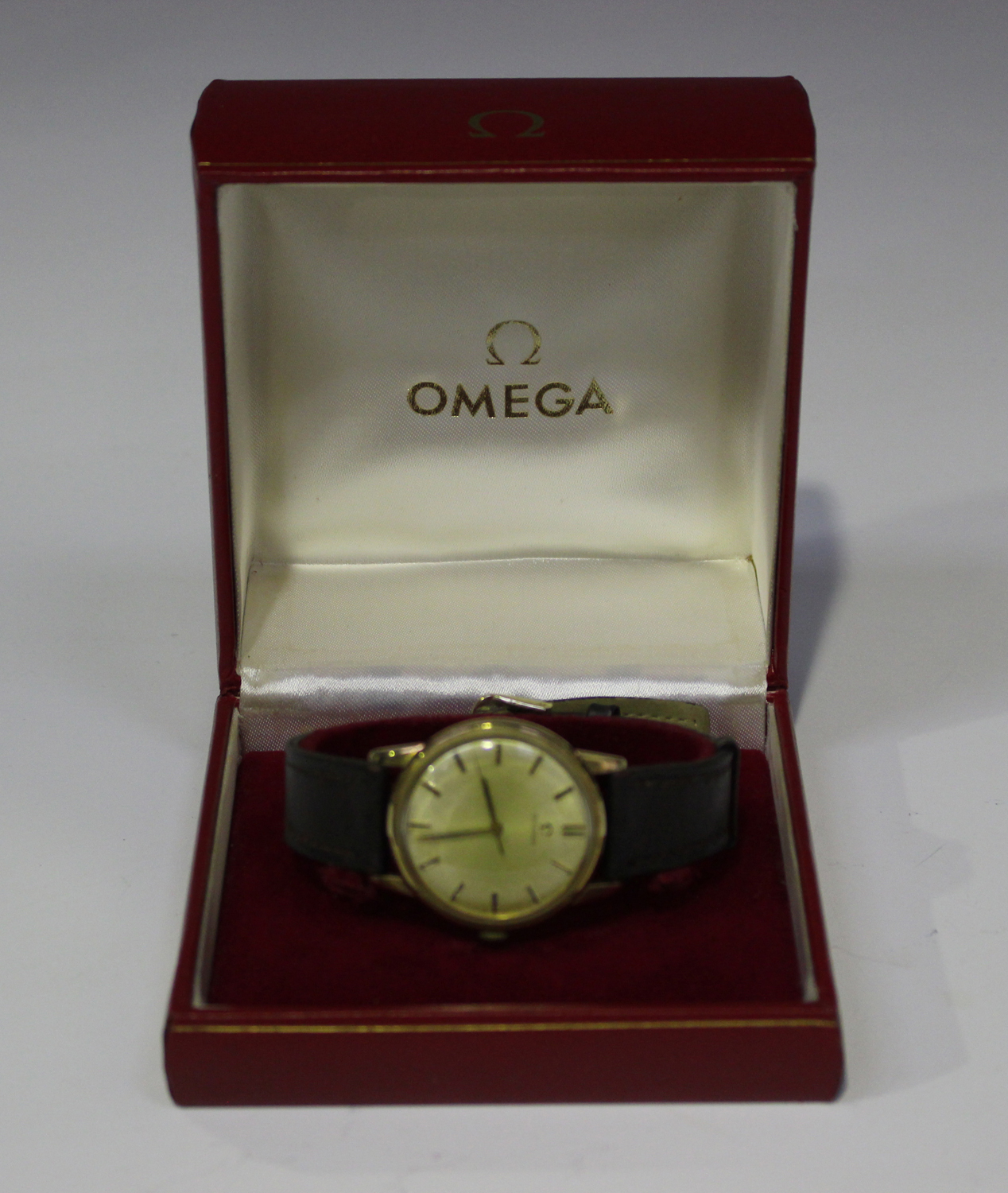 An Omega 9ct gold circular cased gentleman's wristwatch, the jewelled ...