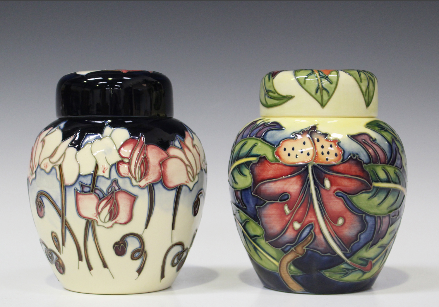 Two pieces of Moorcroft pottery, comprising a Simeon pattern ginger jar ...