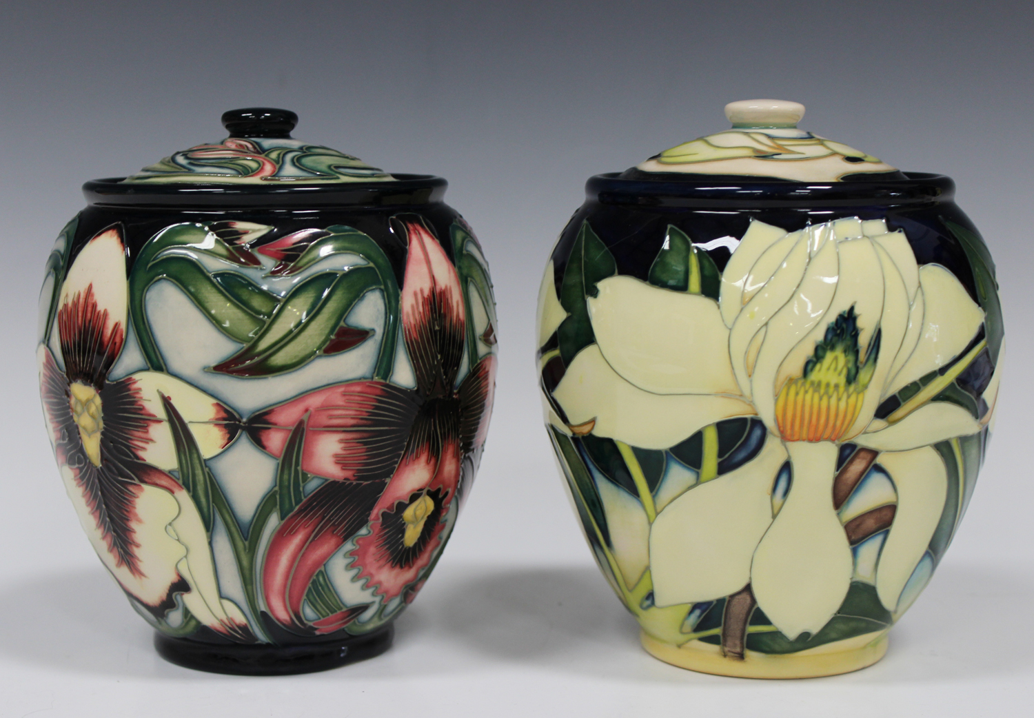 A limited edition Moorcroft pottery Aphrodite pattern jar and cover ...