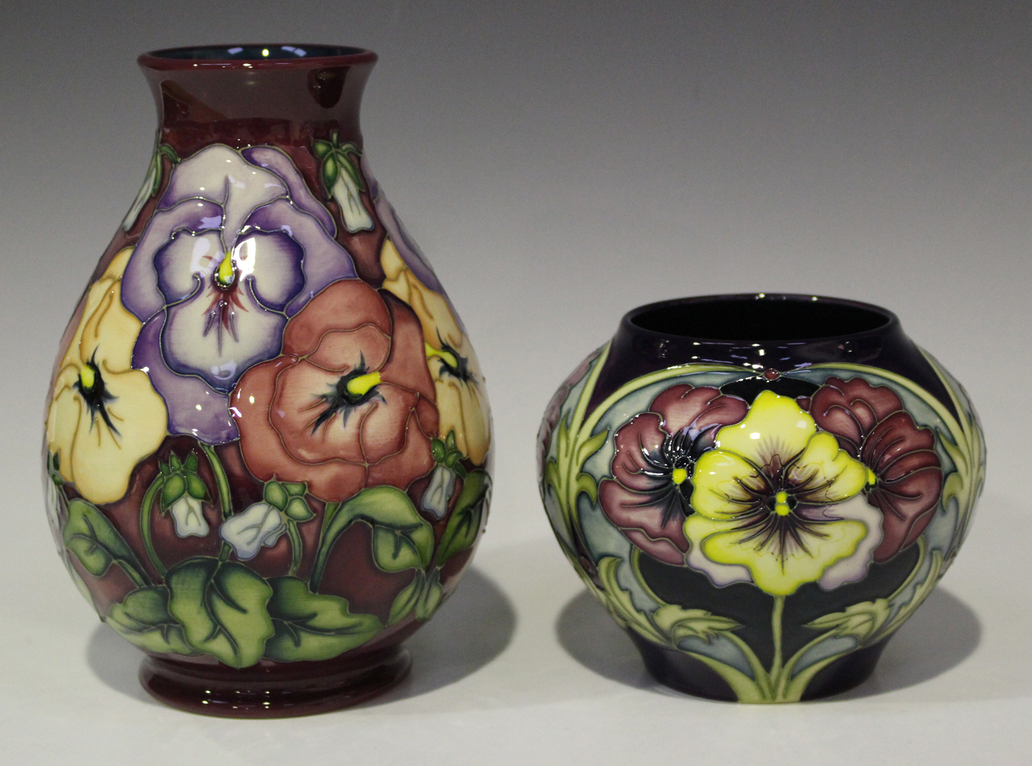 A Moorcroft pottery Pansy pattern vase, circa 1994, designed by Rachel ...