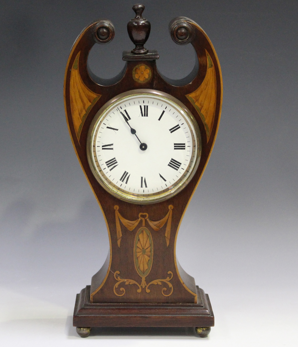 An Edwardian mahogany mantel timepiece with platform escapement and ...