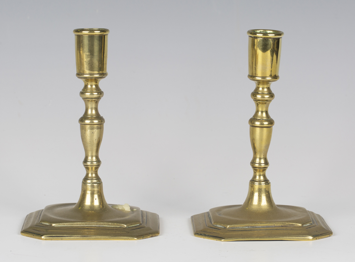 A Pair Of Early George Iii Brass Candlesticks With Canted Square Bases Height 15cm 