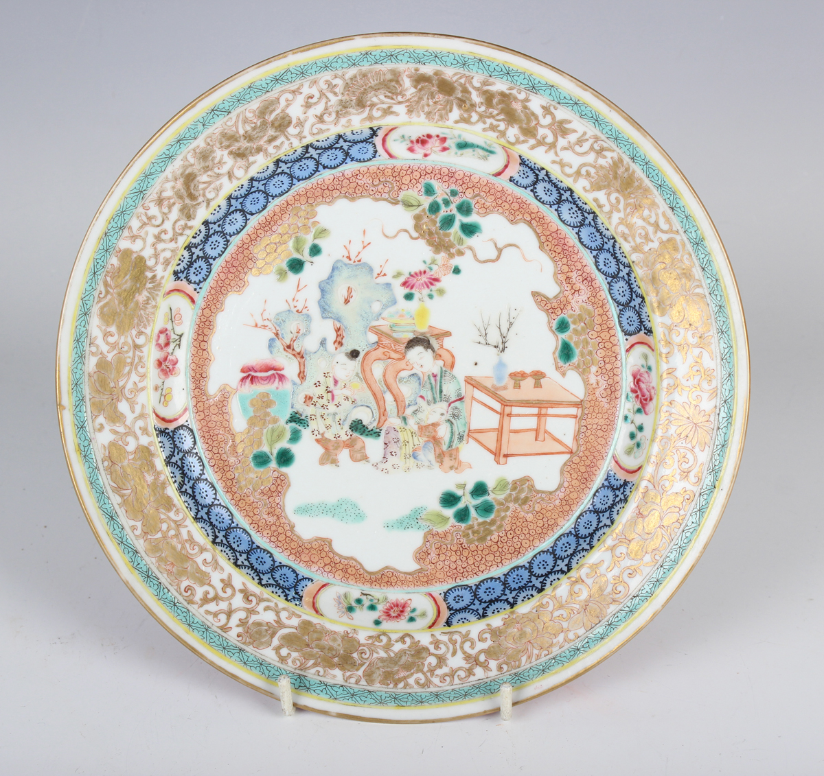 A Chinese famille rose ruby back porcelain plate, mark of Qianlong ...