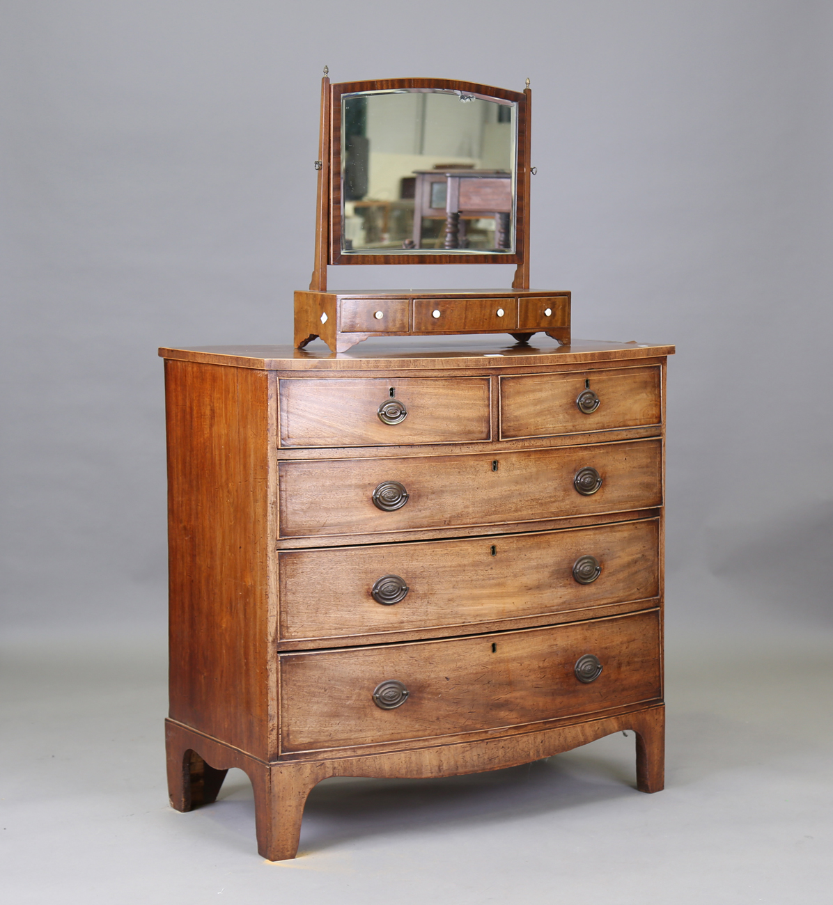 A Late George Iii Mahogany Bowfront Chest Of Two Short And Three Graduated Long Drawers On Bracket