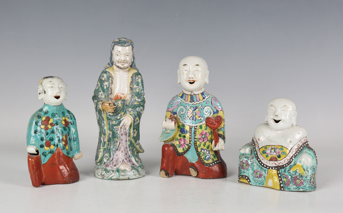 A group of three Chinese famille rose export porcelain figures, Qing ...