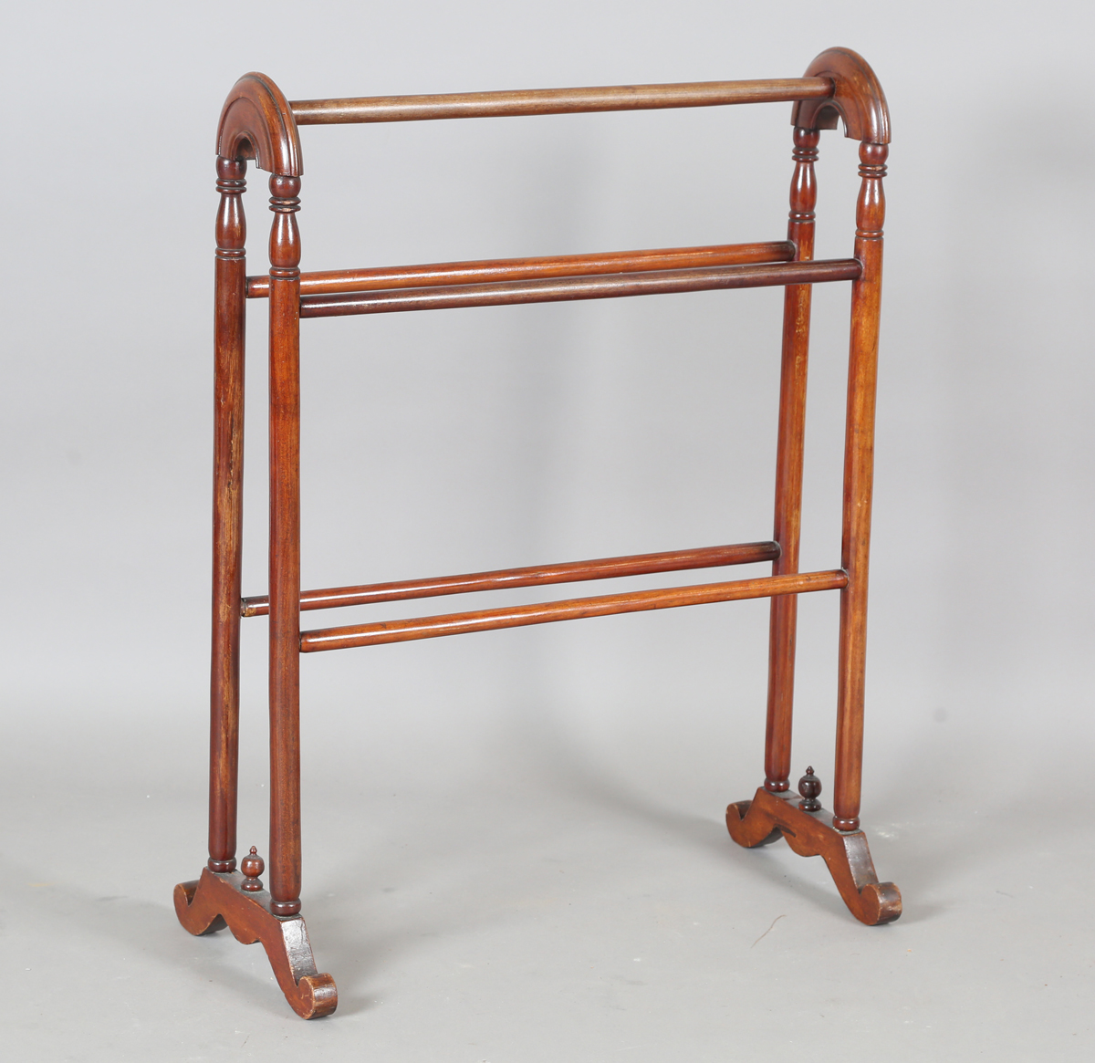 A Victorian mahogany towel rail of turned form, height 84cm, width 63cm ...