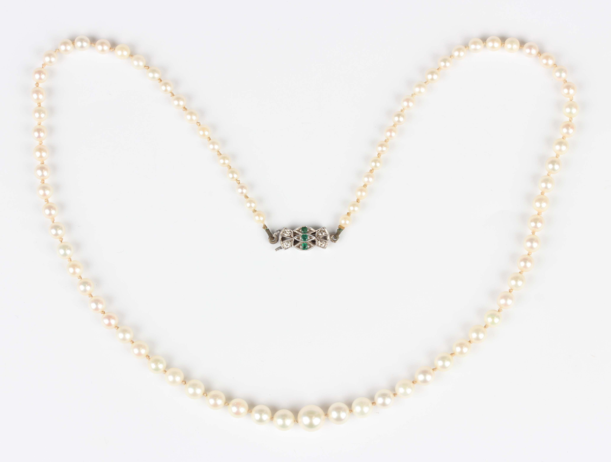 A Lotus single row necklace of graduated cultured pearls on a diamond ...