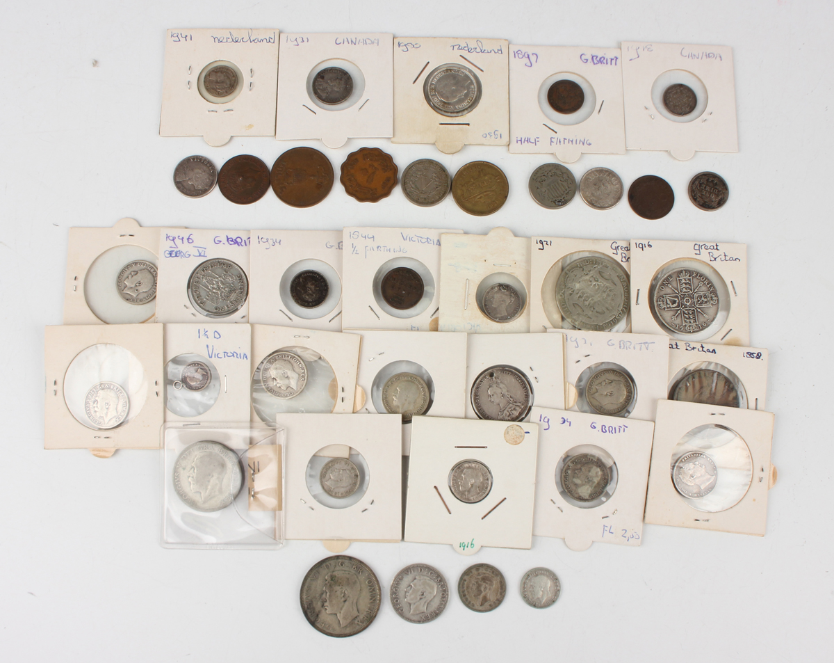 A collection of European and world coins and banknotes, including China ...