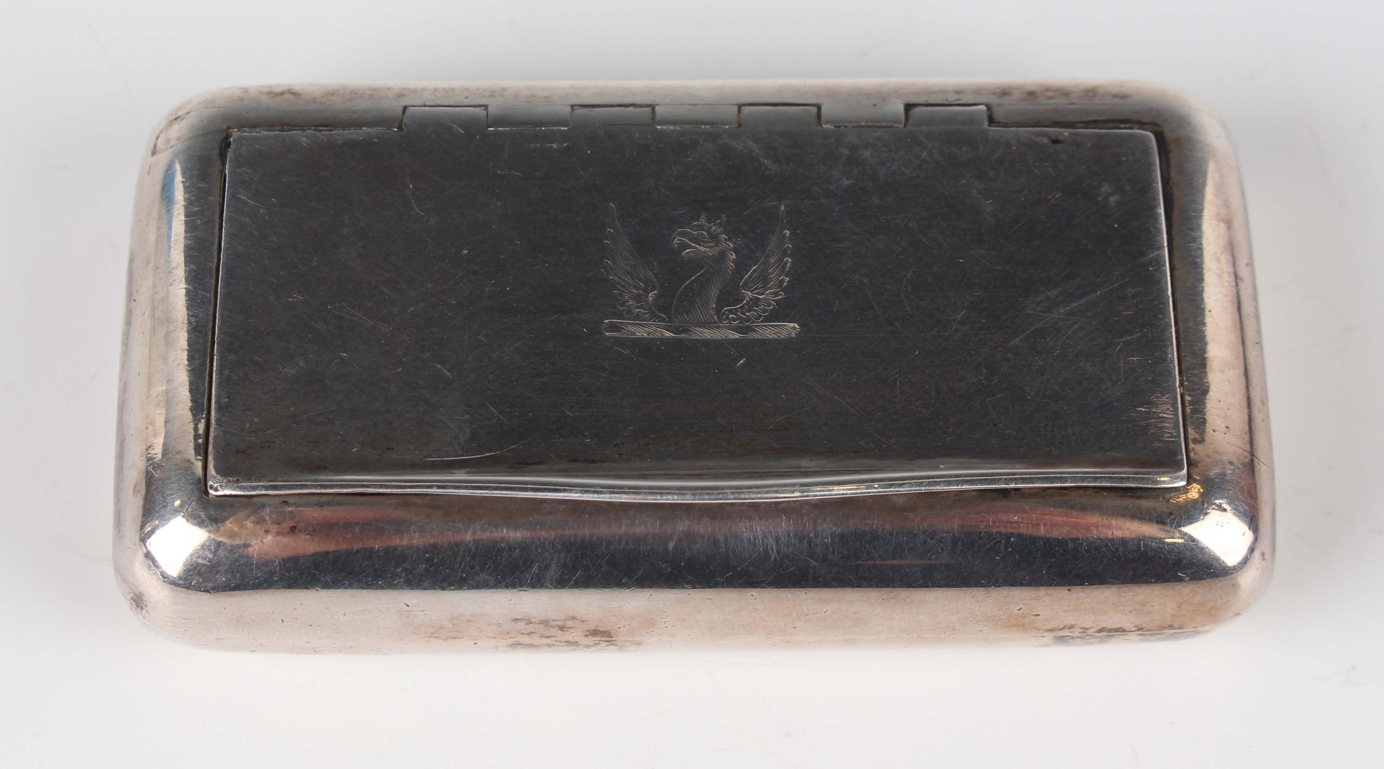 A George III silver rectangular snuff box, the hinged lid crest ...